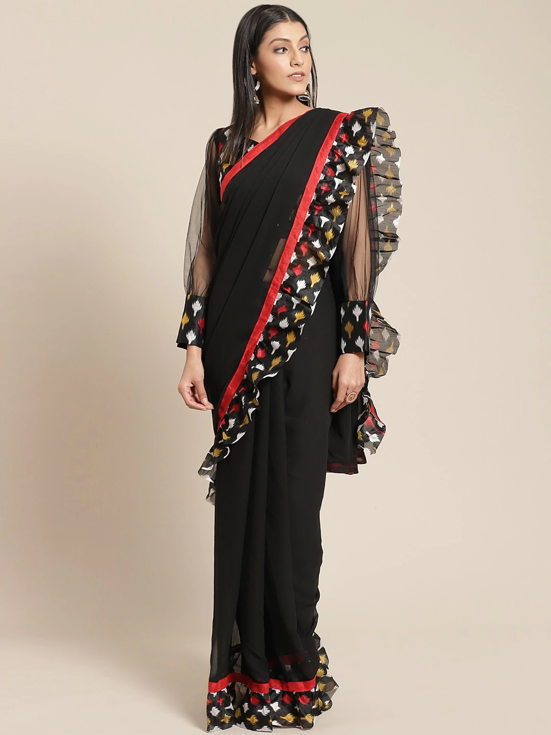 Fusion Black Georgette Ruffed Saree With Bold Ikat inspired Prints